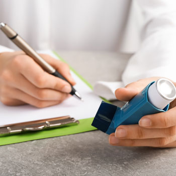 Person Writting Prescriptions